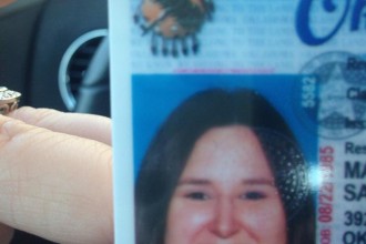 Sarah Doolin Maib shows off her shiny new license obtained from a progressive branch of Oklahoma's privatized DMVs