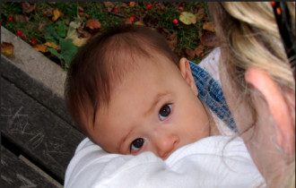 Woman Breastfeeding Baby
