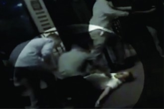 Marines attending to an unconscious man are mistaken as being involved in a fight.  Police assaulted and arrested them - Screengrab from YouTube
