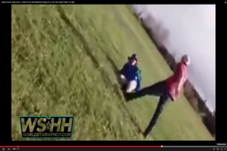Bully picking on kid walking home from school. Pic via youtube screen grab.