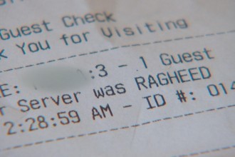 A Texas waiter was fired after writing a racist remark on guest checks