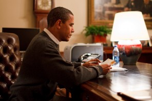 Obama reading letter
