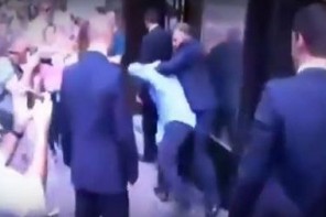 Trump Security Punches Latino In The Head For Daring To Protest Trump’s Racism (VIDEO)