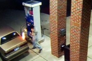Watch This ‘Genius’ Try To Kill A Spider With A Lighter, While Putting Gas In His Car (VIDEO)