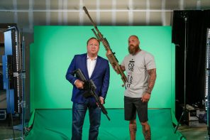 Jimmy Kimmel Mockery Rattled Alex Jones So Badly That He Hired This Guy To Guard Him (AUDIO)